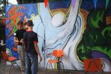 Graffity op schermen bij 40 jarig bestaan, door de jeugd gemaakt